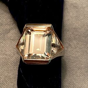Bling!   Large Emerald cut CZ set in SS.